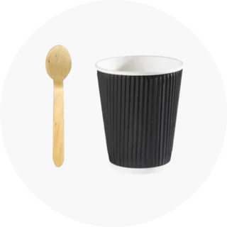 Coffee cup and wooden spoon